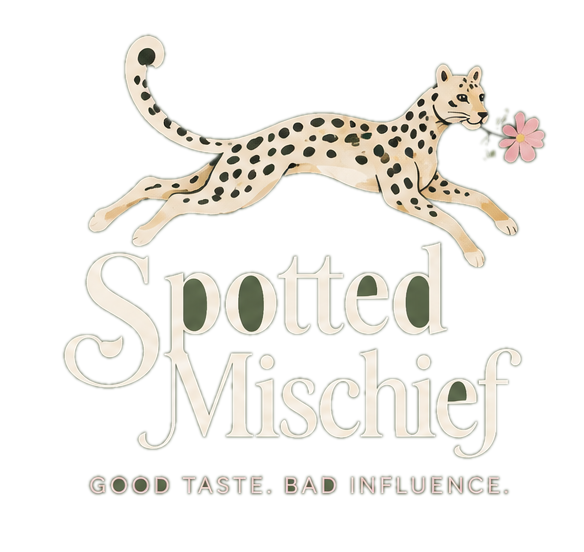 Spotted Mischief — leaping leopard with a pink flower above the Spotted Mischief script logo